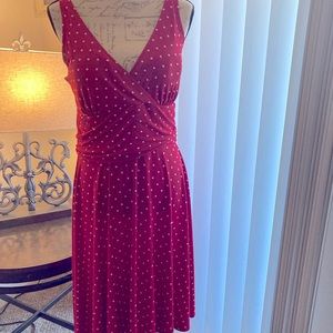 Red dress with white polka dots.